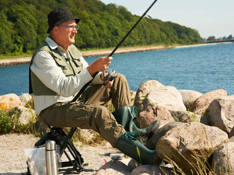 Seasonal Fishing Tips: Anglers enjoying fishing in various seasons, highlighting tips for spring, summer, fall, and winter fishing.